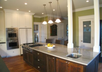 View from Kitchen prep area across Kitchen Island with its downdraft cooktop and veggie sink