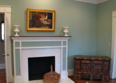 Fireplace in Master Sitting with simplified Neo-Classical Mantel Shelf and Surround